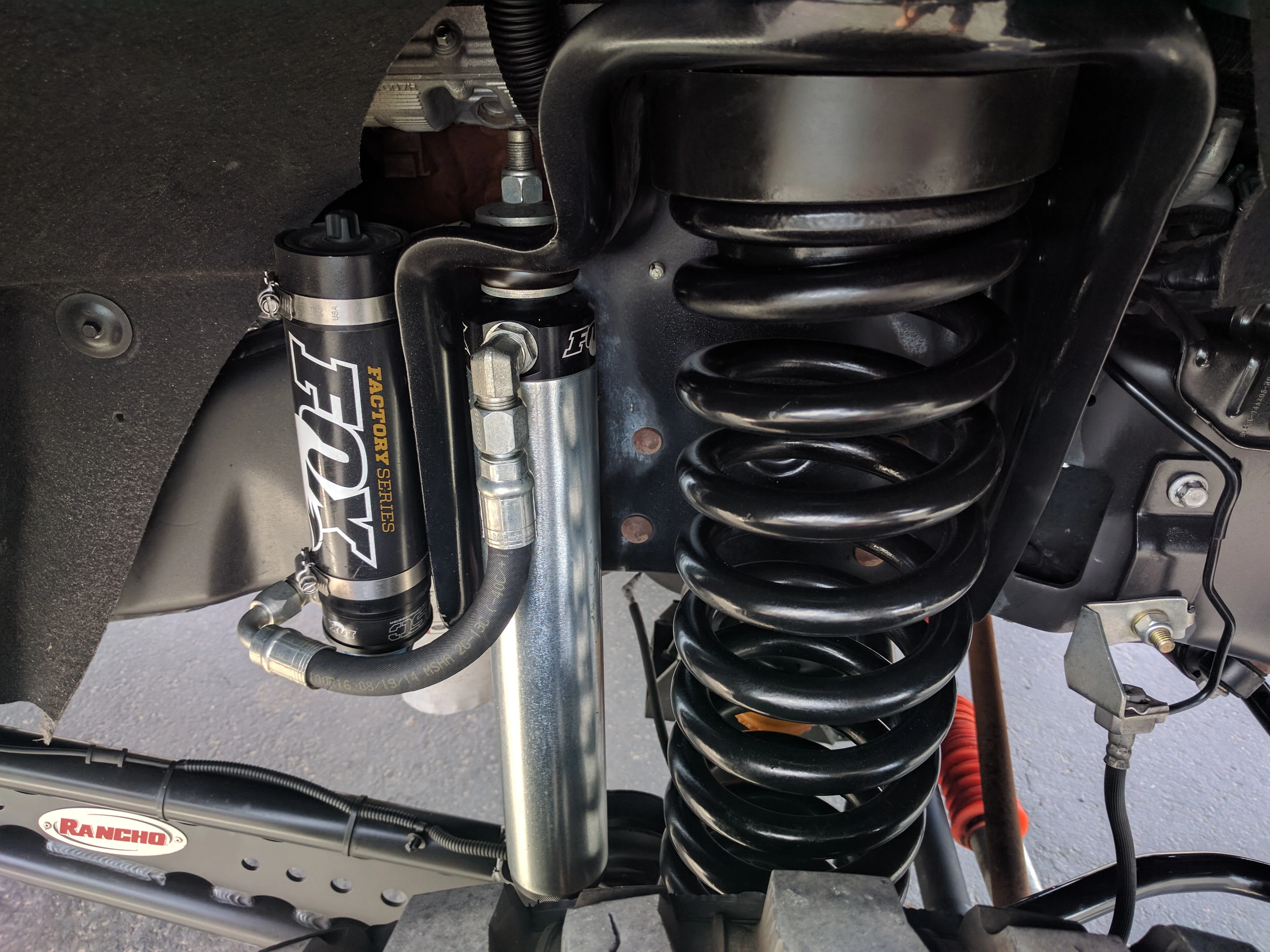 Fox 2.5 Factory Series Reservoir Shocks Front Pair for 2014-2023 Ram 2500 4WD - Image 3